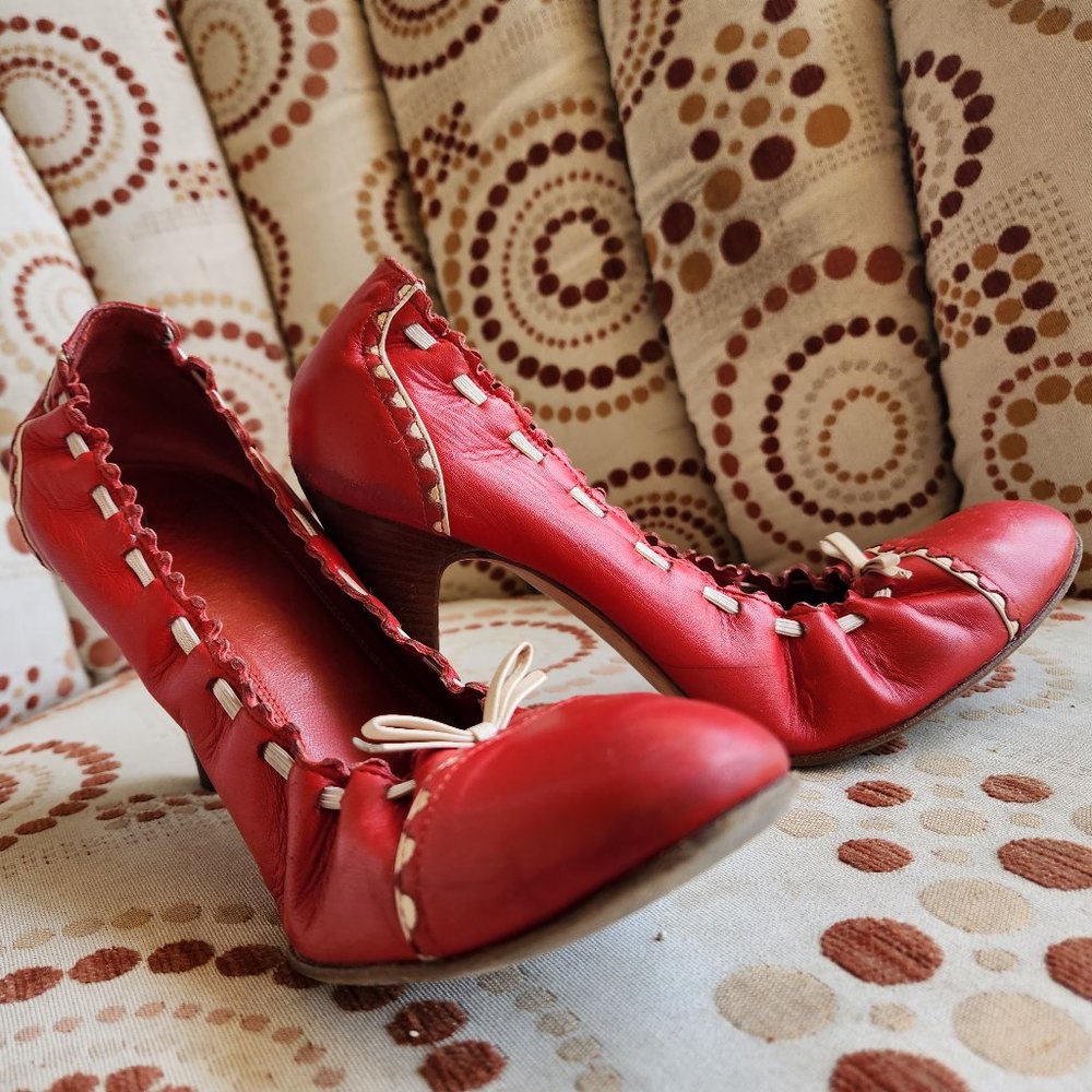 Red Bally Leather Pumps with scalloped edges and white bow